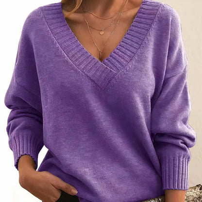 Soft cashmere blend women's sweater featuring a deep V-neck and relaxed fit, perfect for everyday comfort and style. 9
