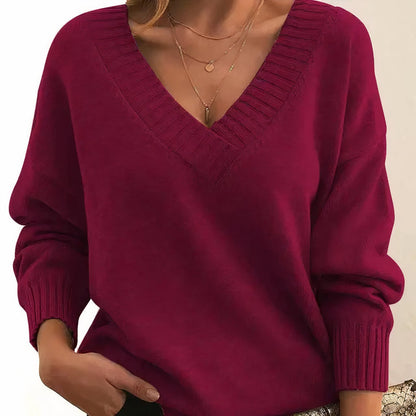 Soft cashmere blend women's sweater featuring a deep V-neck and relaxed fit, perfect for everyday comfort and style. 7