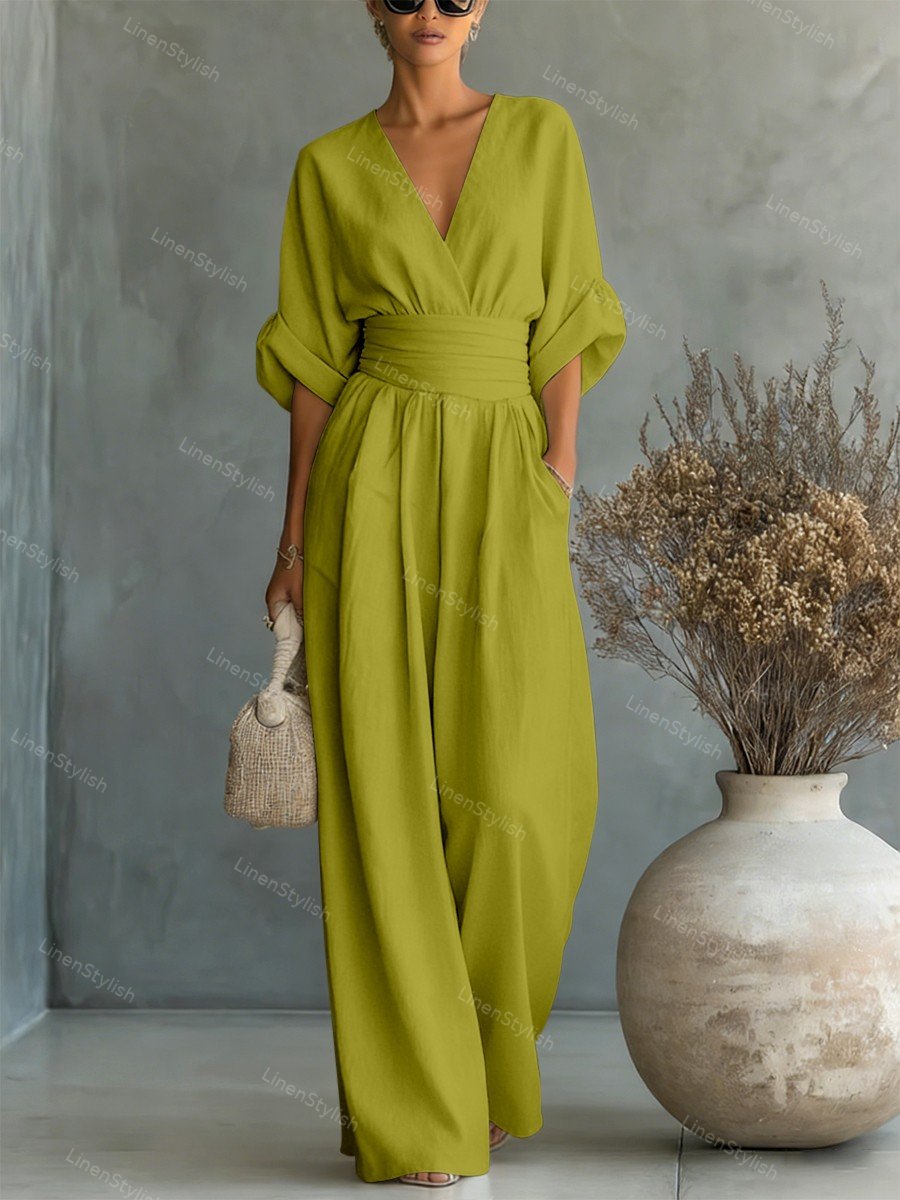 Casual V-Neck Jumpsuit for Women featuring a flattering waistline, made from soft and comfortable fabric, available in black and white options. 6