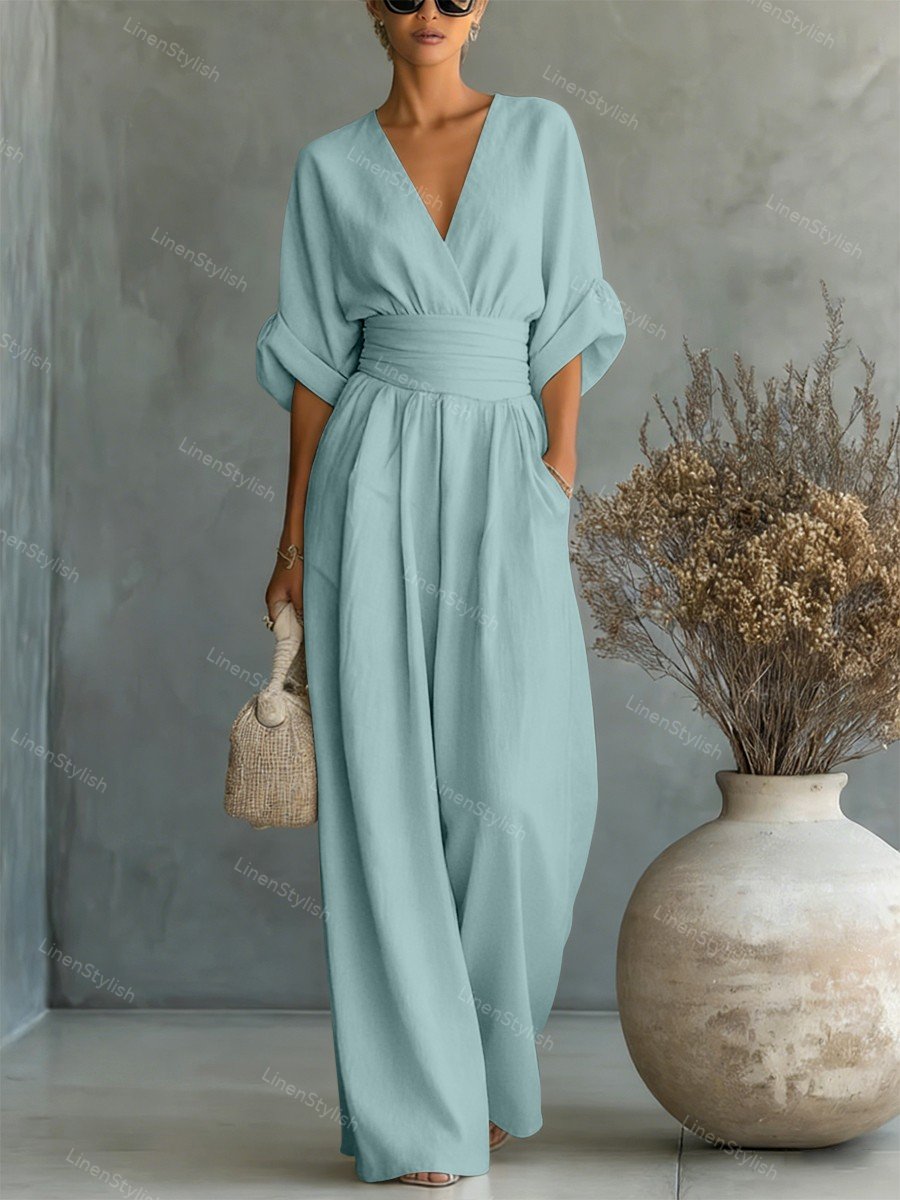 Casual V-Neck Jumpsuit for Women featuring a flattering waistline, made from soft and comfortable fabric, available in black and white options. 11