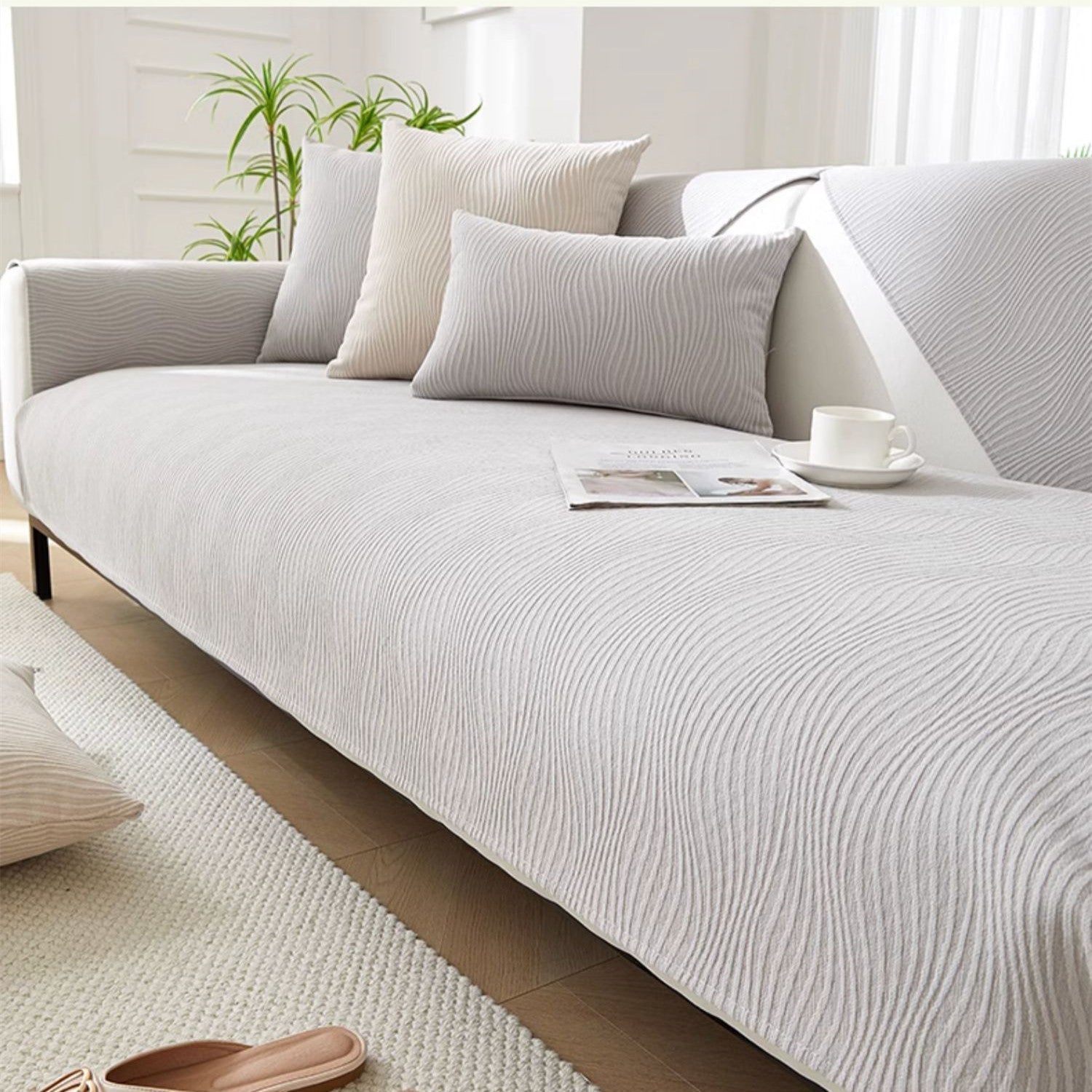 Chenille sofa cover with non-slip backing in a modern minimalist design, perfect for enhancing the look of any sofa while providing protection and comfort. 1