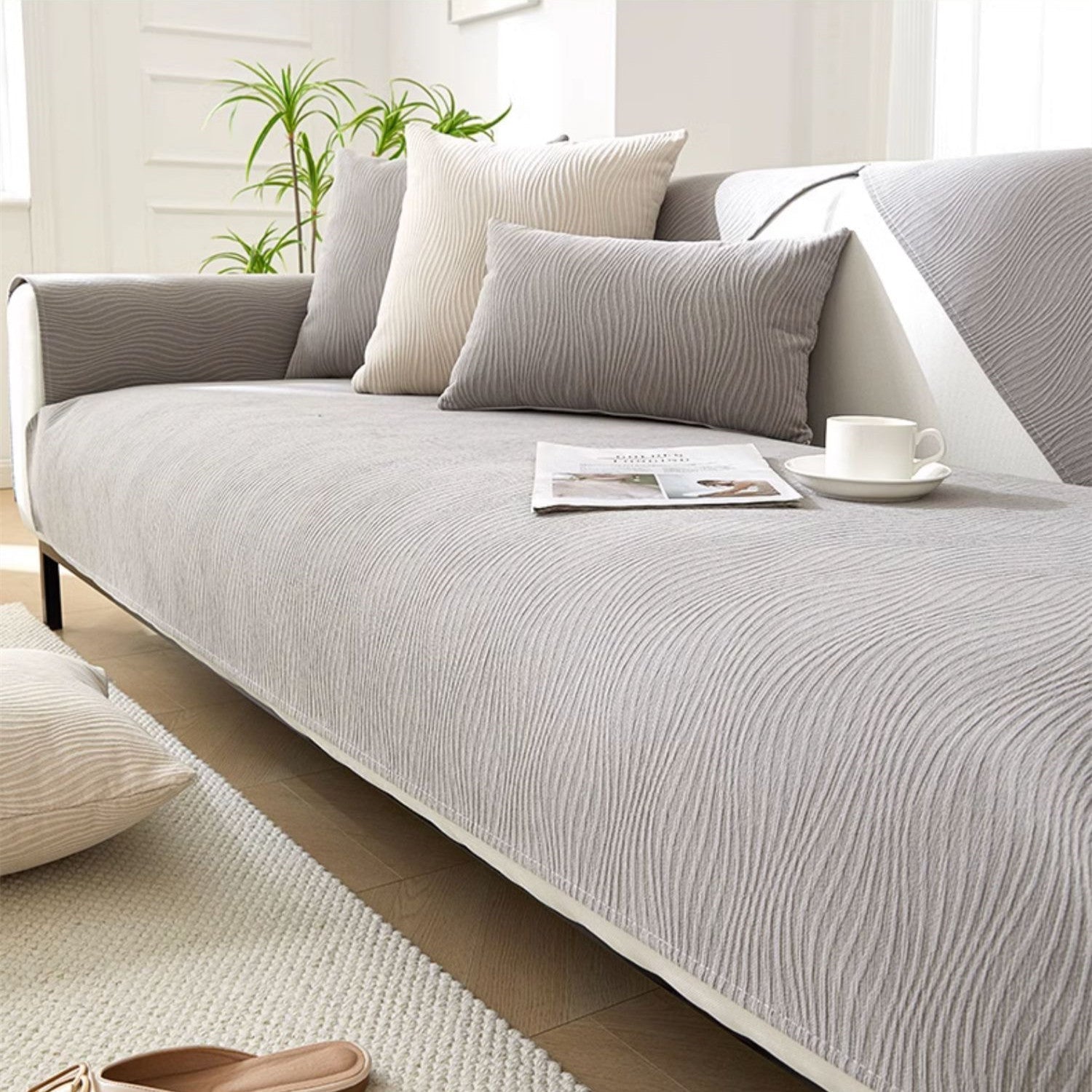 Chenille sofa cover with non-slip backing in a modern minimalist design, perfect for enhancing the look of any sofa while providing protection and comfort. 0
