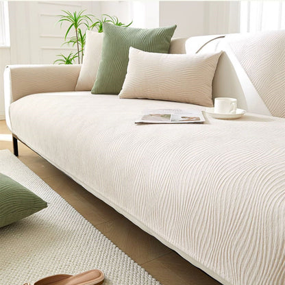 Chenille sofa cover with non-slip backing in a modern minimalist design, perfect for enhancing the look of any sofa while providing protection and comfort. 4