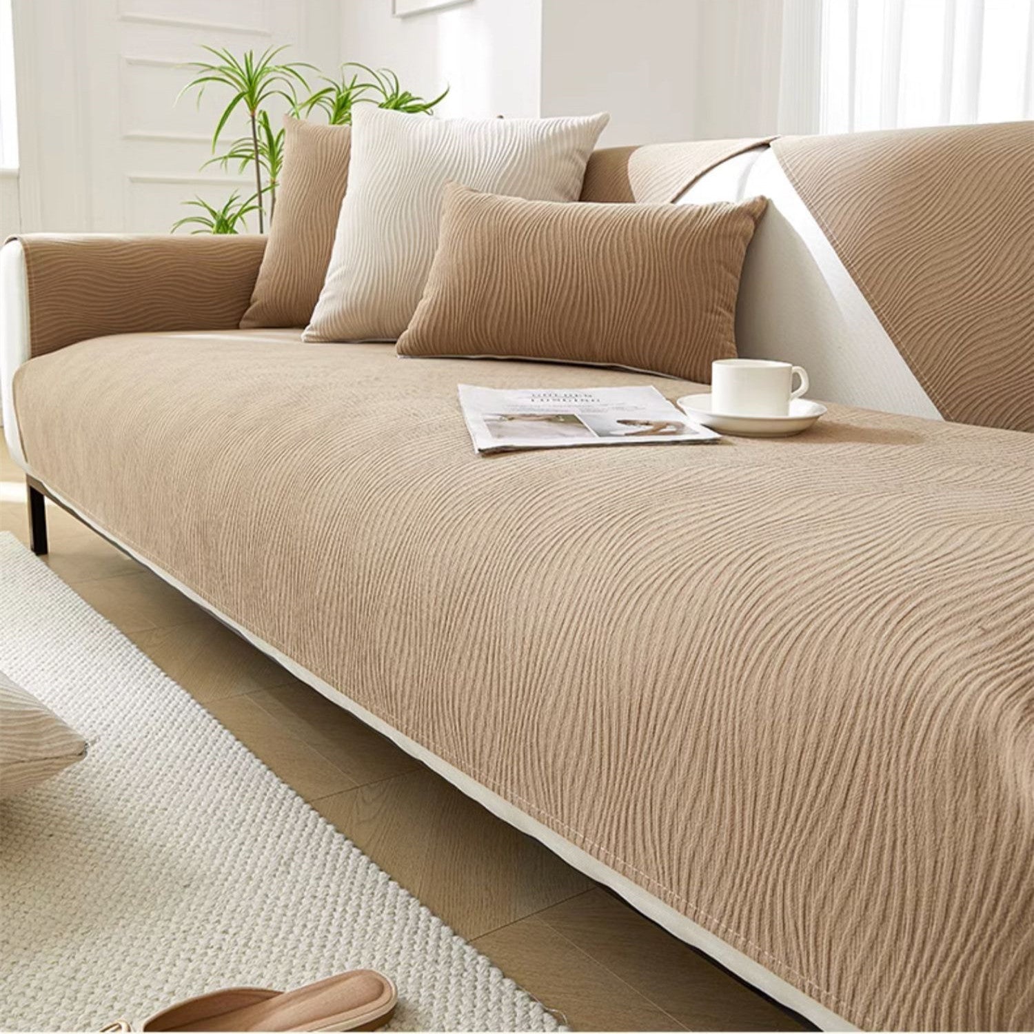 Chenille sofa cover with non-slip backing in a modern minimalist design, perfect for enhancing the look of any sofa while providing protection and comfort. 2