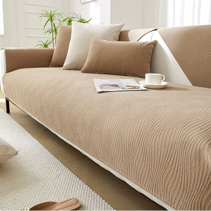 Chenille sofa cover with non-slip backing in a modern minimalist design, perfect for enhancing the look of any sofa while providing protection and comfort. 2