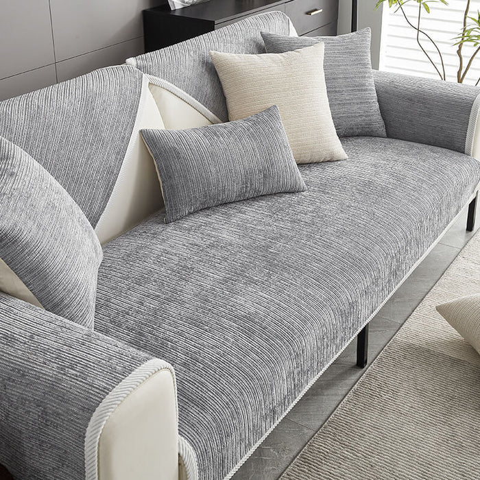 Chenille sofa cover with non-slip backing, designed for pet-friendly use and machine washable for easy cleaning, providing stylish protection for your couch. 1