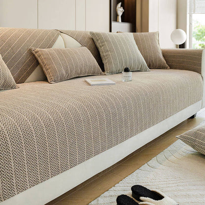 Chenille sofa cover with non-slip design, ideal for pet owners, resistant to dog hair, easy to clean, and machine washable couch slipcover. 1