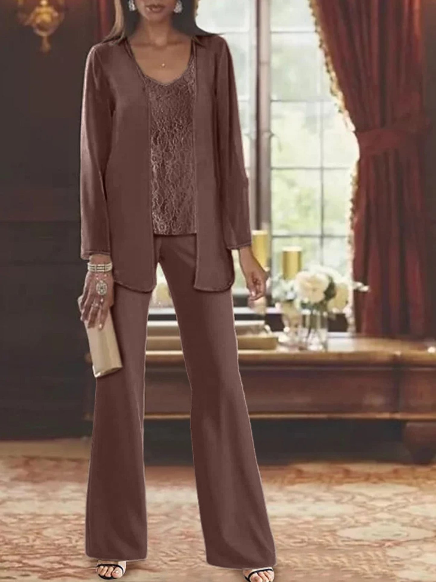 Elegant champagne chiffon pantsuit with jacket, designed for the mother of the bride, featuring a sophisticated and stylish look perfect for weddings. 70