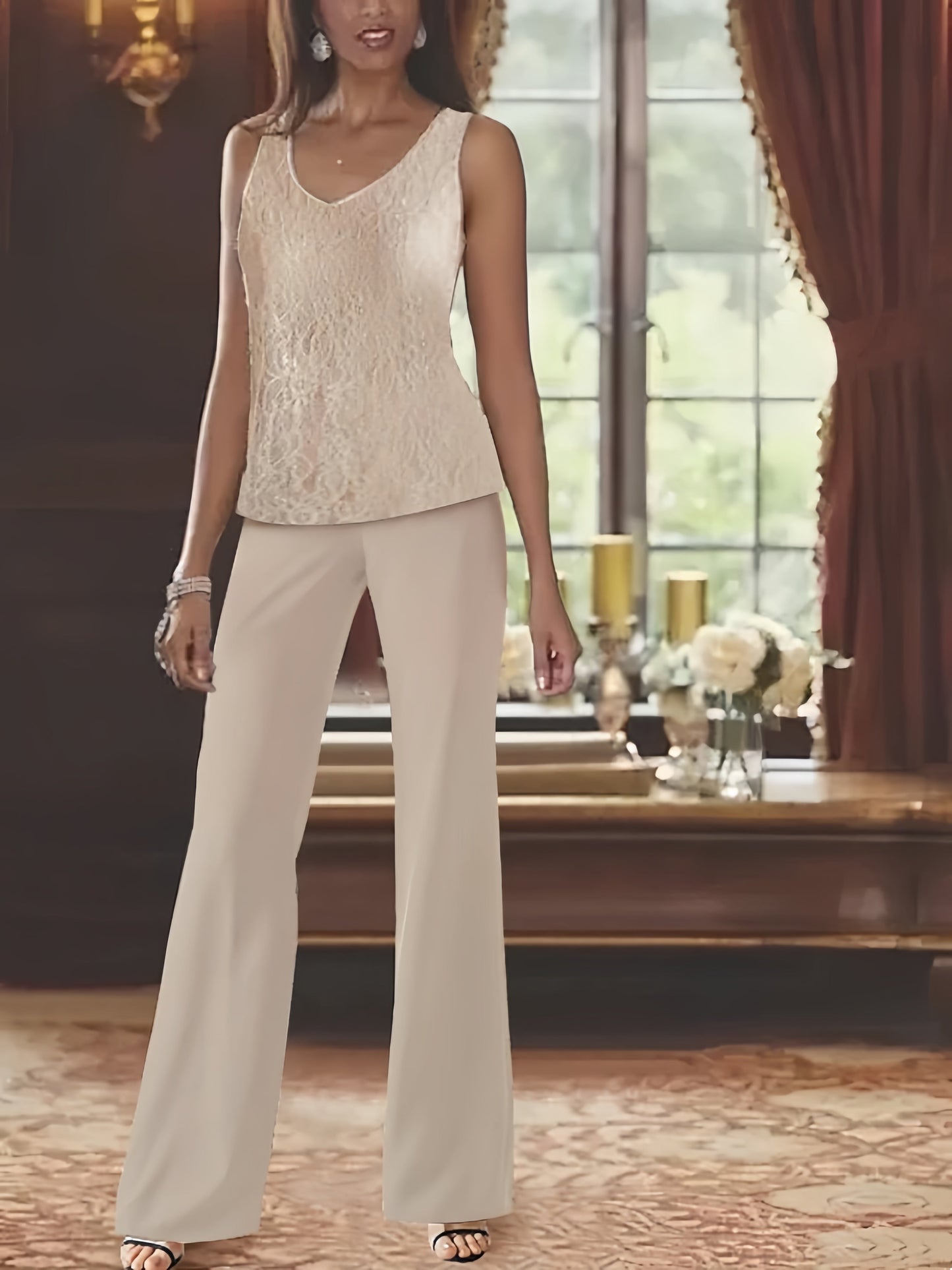 Elegant champagne chiffon pantsuit with jacket, designed for the mother of the bride, featuring a sophisticated and stylish look perfect for weddings. 2