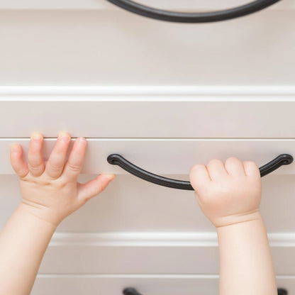 Child safety cabinet locks featuring an invisible adhesive latch for easy no-drill installation, perfect for securing drawers and cupboards to keep toddlers safe. 4
