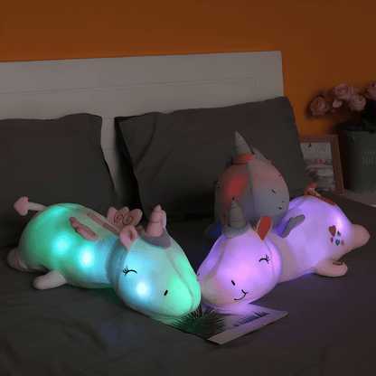 Children's plush night light featuring a soft unicorn design, providing a soothing LED glow for a comforting bedtime experience. 5