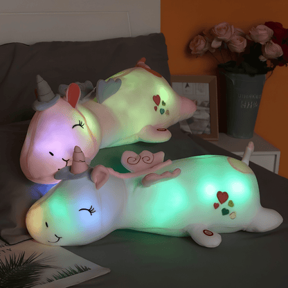 Children's plush night light featuring a soft unicorn design, providing a soothing LED glow for a comforting bedtime experience. 4