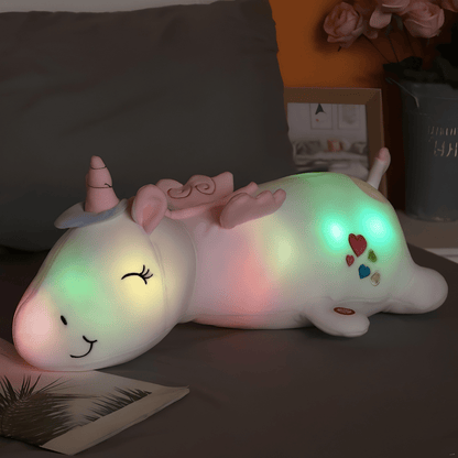 Children's plush night light featuring a soft unicorn design, providing a soothing LED glow for a comforting bedtime experience. 3
