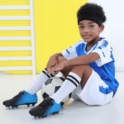 Children's soccer cleats designed for enhanced ball control and grip, featuring a durable construction suitable for firm ground play, perfect for young athletes. 2