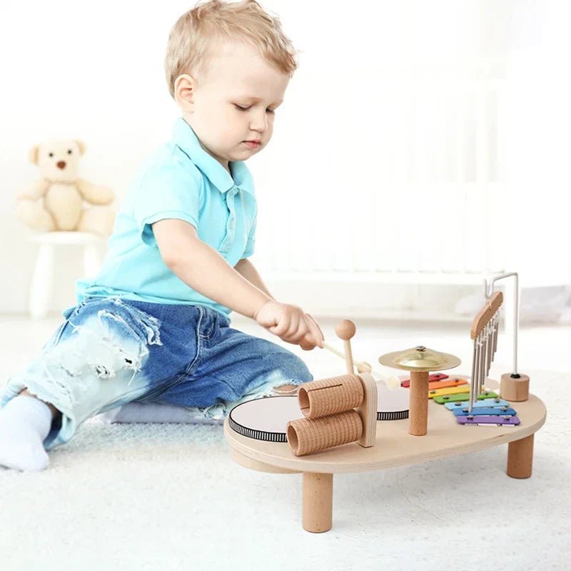 Children's wooden music set featuring a colorful xylophone and drums, designed for creative play, made from non-toxic materials for safe enjoyment. 1