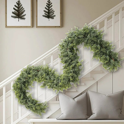 Christmas garland made of natural cypress branches, adorned with cotton accents, perfect for decorating fireplaces and windows during the winter season. 4