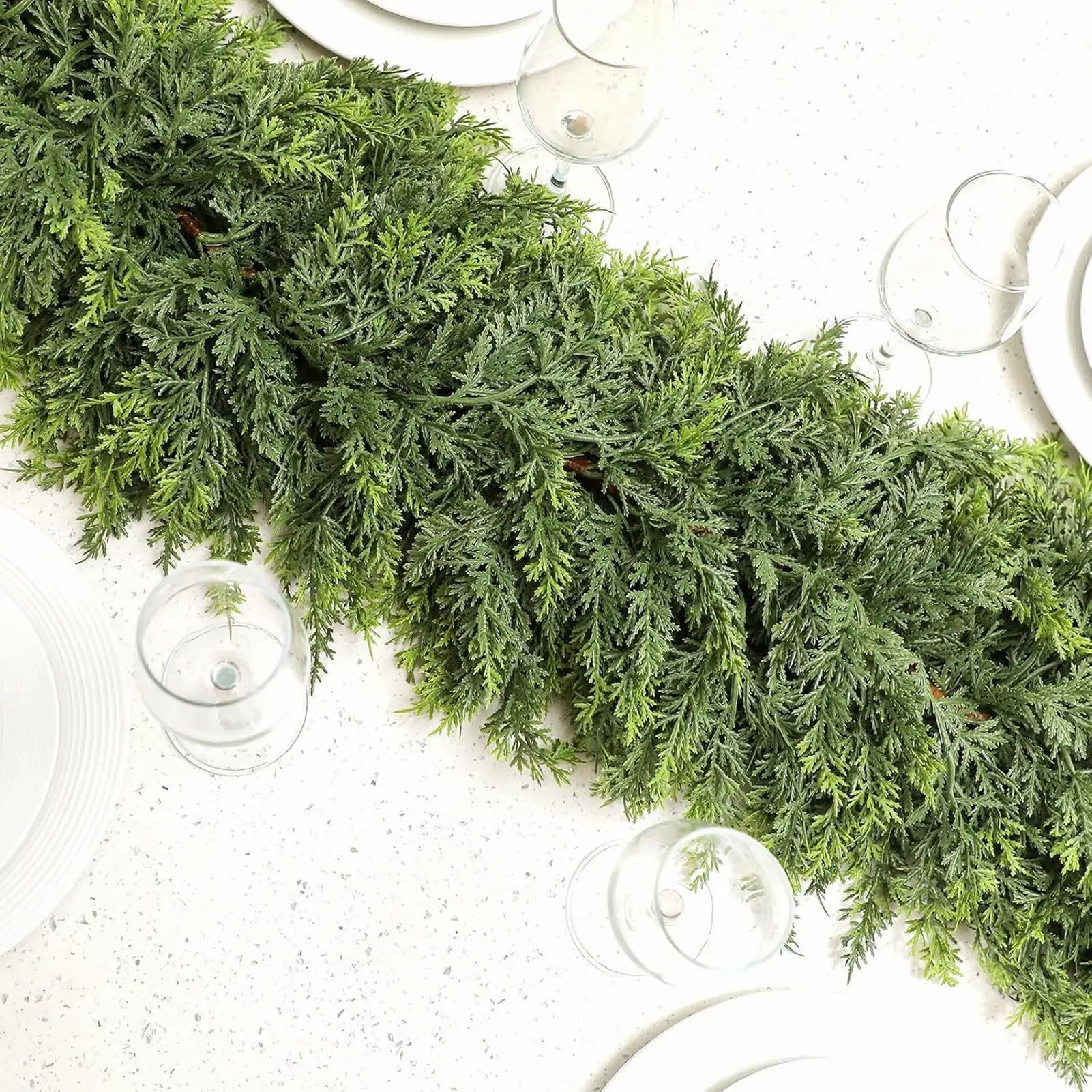 Christmas garland made of natural cypress branches, adorned with cotton accents, perfect for decorating fireplaces and windows during the winter season. 1
