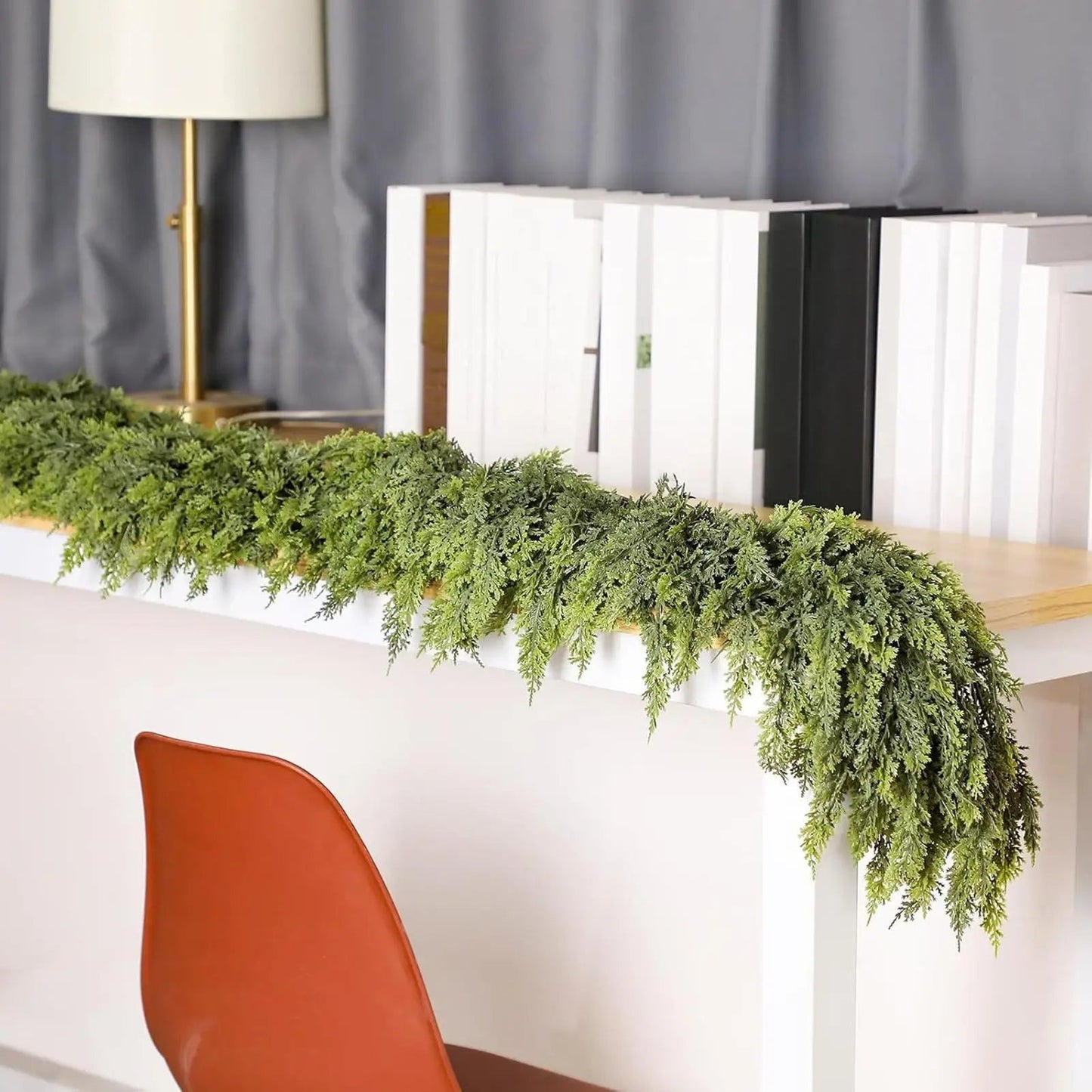 Christmas garland made of natural cypress branches, adorned with cotton accents, perfect for decorating fireplaces and windows during the winter season. 5