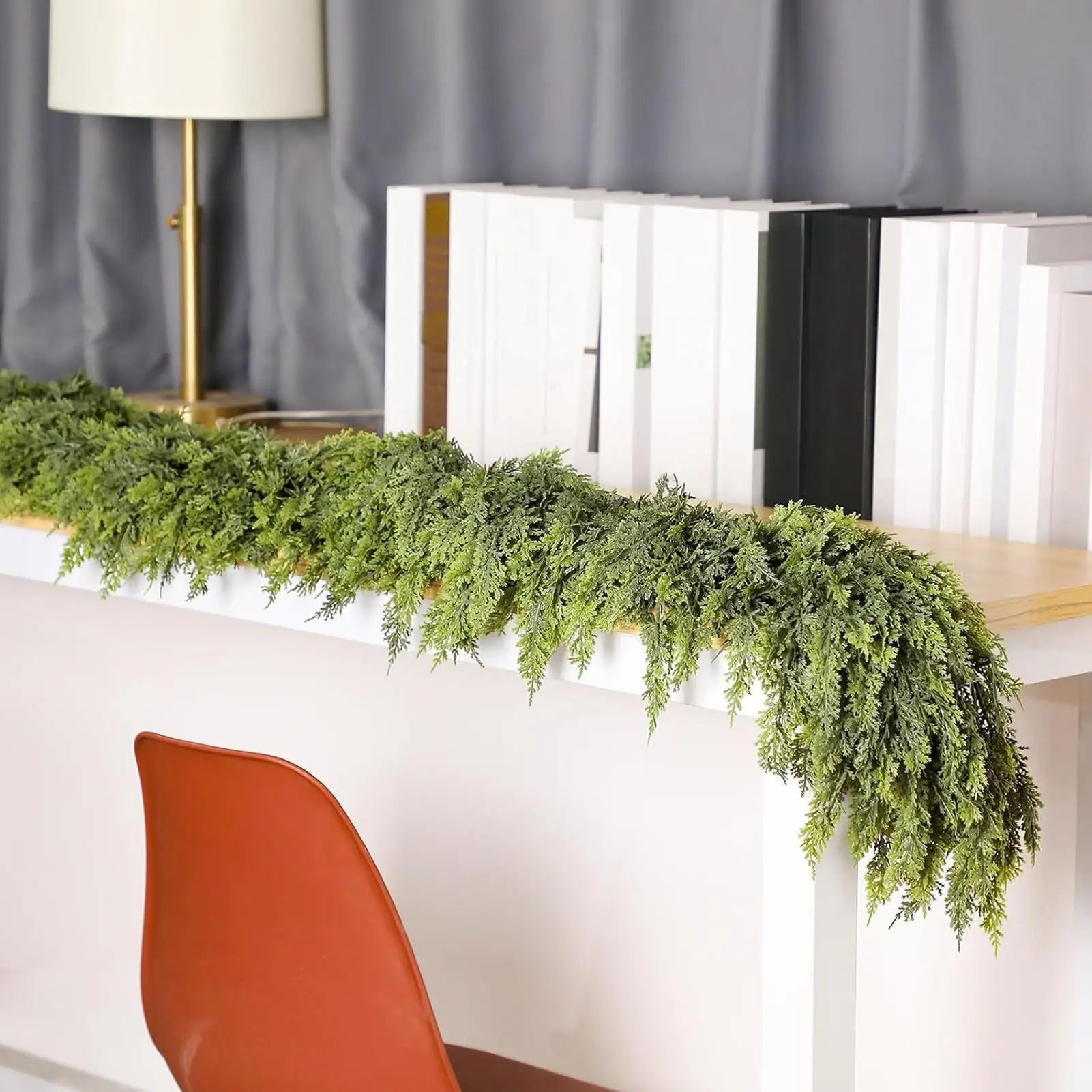 Christmas garland made of natural cypress branches, adorned with cotton accents, perfect for decorating fireplaces and windows during the winter season. 5