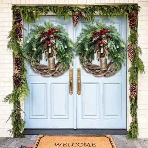 Christmas wreath featuring pinecones and golden bells, perfect for rustic farmhouse holiday door decor, measuring 43.18cm in diameter. 1