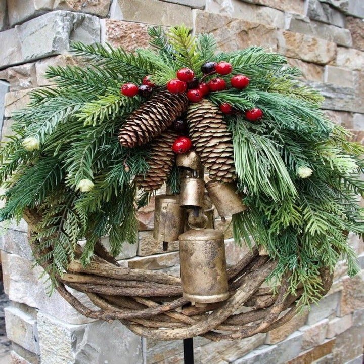 Christmas wreath featuring pinecones and golden bells, perfect for rustic farmhouse holiday door decor, measuring 43.18cm in diameter. 4