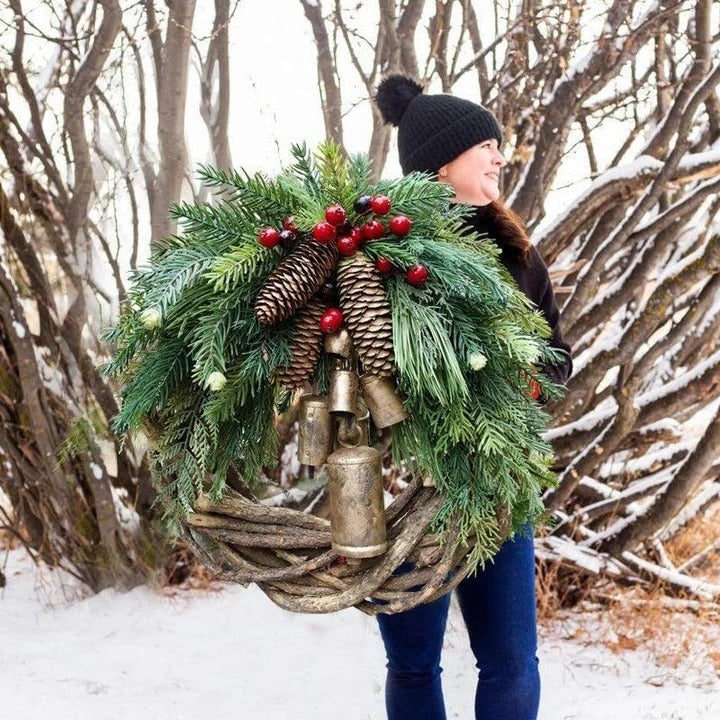 Christmas wreath featuring pinecones and golden bells, perfect for rustic farmhouse holiday door decor, measuring 43.18cm in diameter. 0