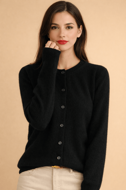 Classic women's cardigan featuring front buttons and a timeless round neck design, perfect for layering in any season. 0