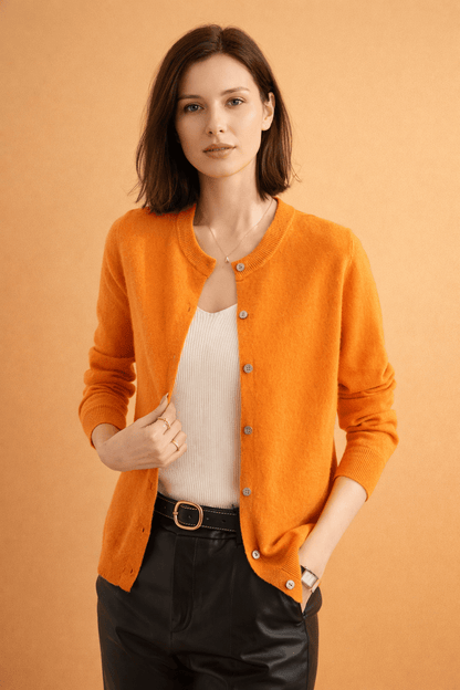 Classic women's cardigan featuring front buttons and a timeless round neck design, perfect for layering in any season. 5