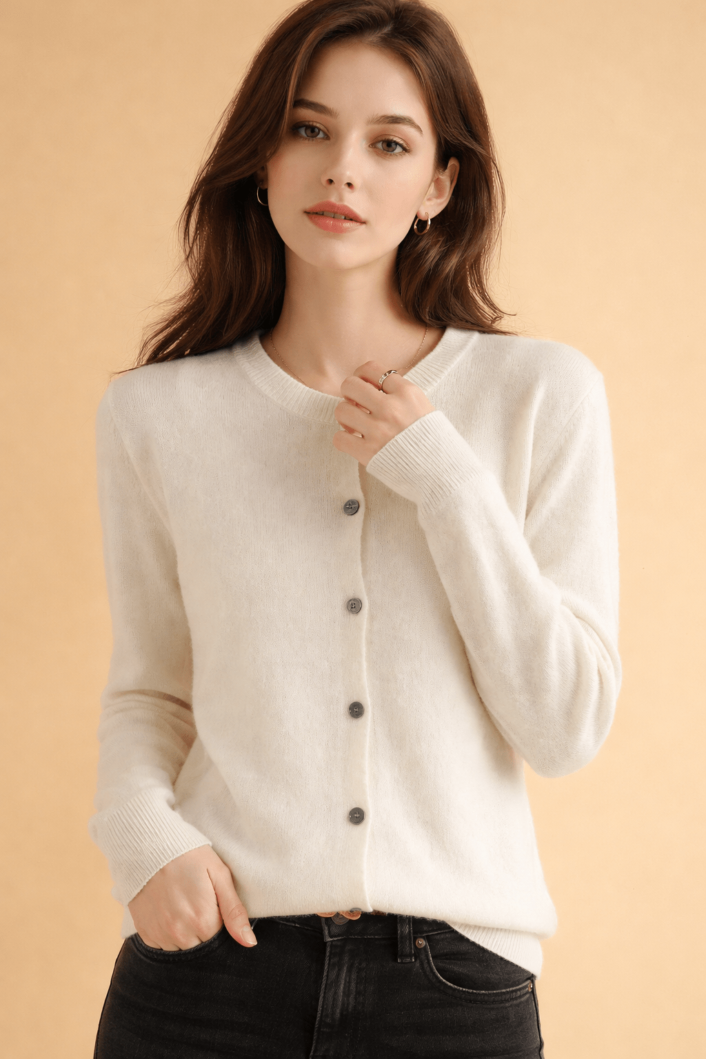Classic women's cardigan featuring front buttons and a timeless round neck design, perfect for layering in any season. 3