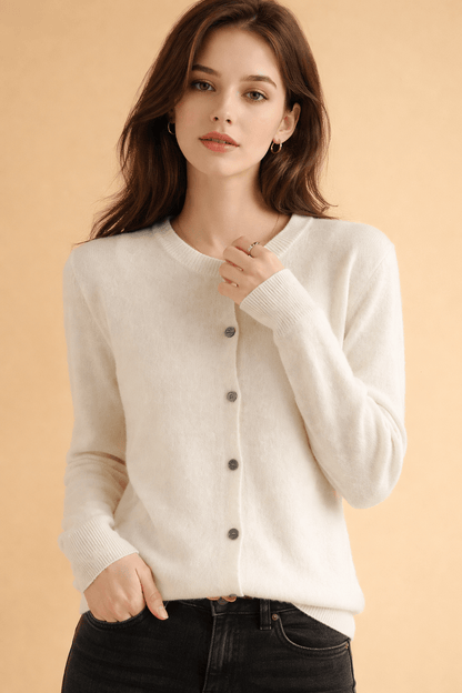 Classic women's cardigan featuring front buttons and a timeless round neck design, perfect for layering in any season. 3