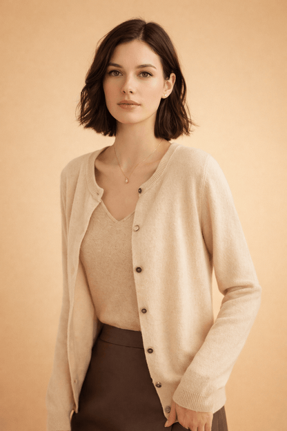 Classic women's cardigan featuring front buttons and a timeless round neck design, perfect for layering in any season. 4