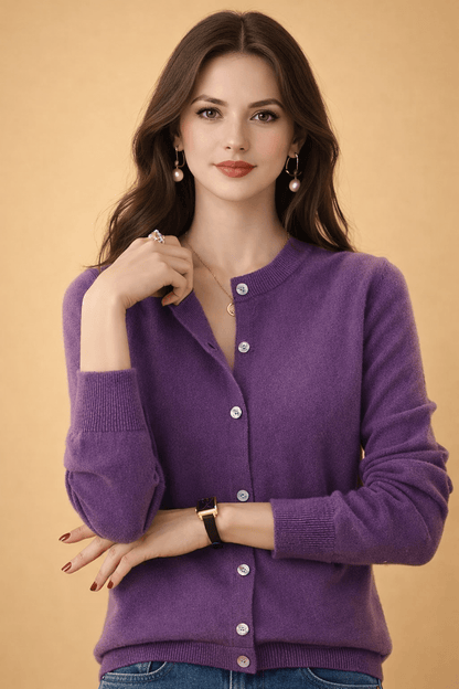 Classic women's cardigan featuring front buttons and a timeless round neck design, perfect for layering in any season. 1