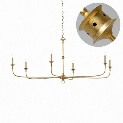 Classic chandelier light in antique brass with a candle-style design, featuring a flexible drop height, perfect for enhancing the elegance of dining rooms and entryways. 11