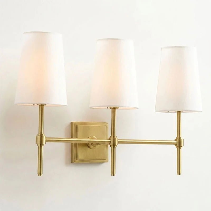 Classic wall light featuring a tapered linen shade and a dimmable function, available in elegant brass, sleek black, or modern brushed nickel finishes. 10