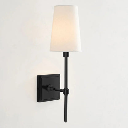 Classic wall light featuring a tapered linen shade and a dimmable function, available in elegant brass, sleek black, or modern brushed nickel finishes. 14
