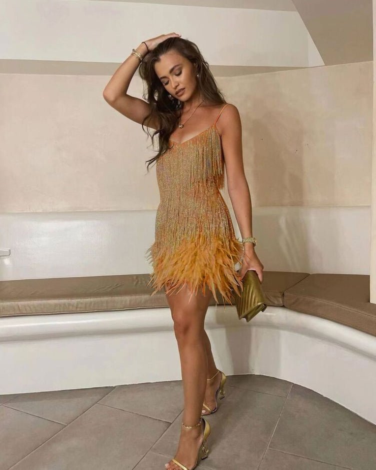 Elegant black cocktail dress featuring fringes and feathers, perfect for weddings and parties, showcasing a glamorous design suitable for evening wear. 4