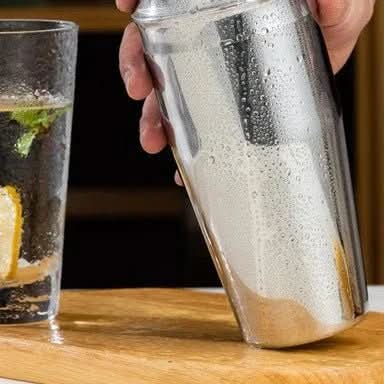 Cocktail shaker set with stand featuring 10-piece stainless steel bar tools in four elegant finishes, perfect for home bartending and cocktail enthusiasts. 5