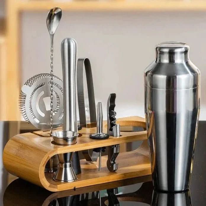 Cocktail shaker set with stand featuring 10-piece stainless steel bar tools in four elegant finishes, perfect for home bartending and cocktail enthusiasts. 1