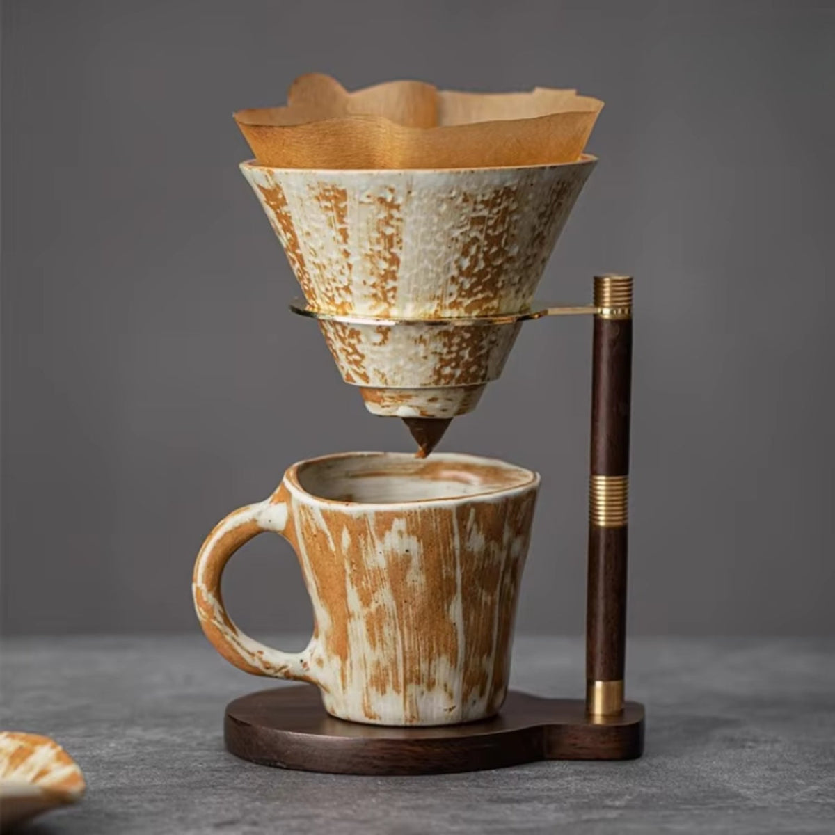 Handcrafted coffee stand featuring a ceramic dripper and a stylish wooden base, ideal for elegant pour-over brewing. 5