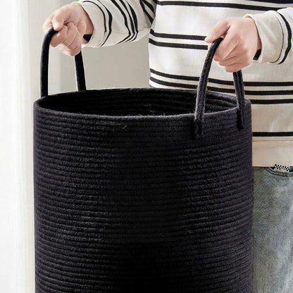 Collapsible laundry basket with a 58L capacity featuring a stylish woven cotton design in natural and black, ideal for laundry and toy storage. 2