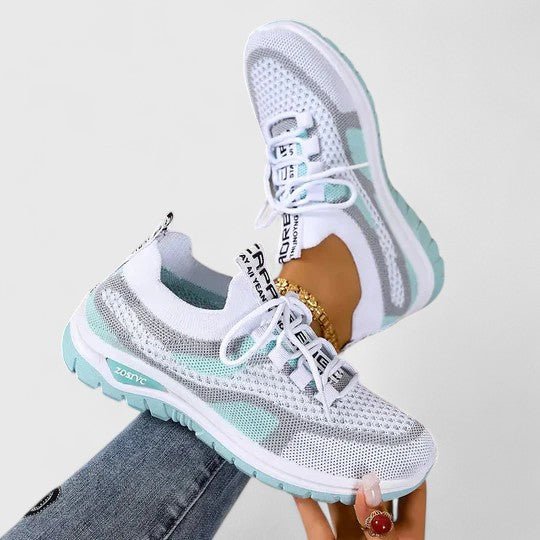 Comfort Support Sneakers featuring a shock-absorbing sole, designed for lightweight breathability and all-day comfort, perfect for active lifestyles. 6