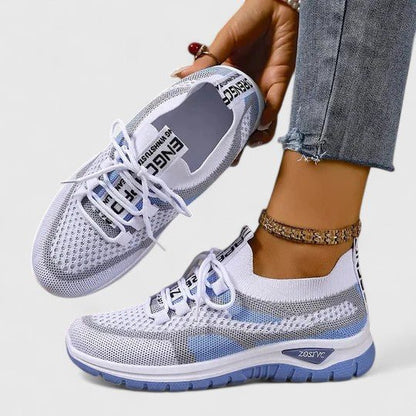 Comfort Support Sneakers featuring a shock-absorbing sole, designed for lightweight breathability and all-day comfort, perfect for active lifestyles. 9