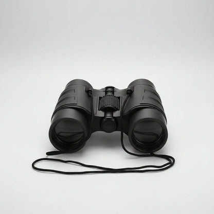 Compact binoculars 4x30 with center focus, featuring a lightweight, rubber-coated design ideal for bird watching and outdoor activities. 1