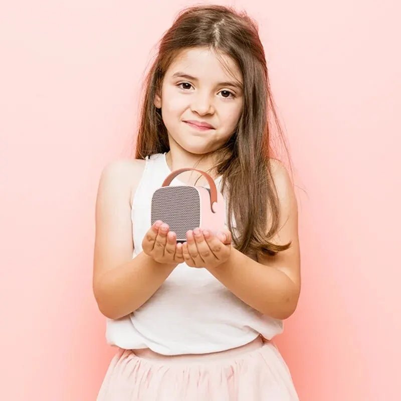 Compact Bluetooth karaoke device featuring TF card support, designed as a portable ABS music speaker for home entertainment, perfect for singing and enjoying music anywhere. 1