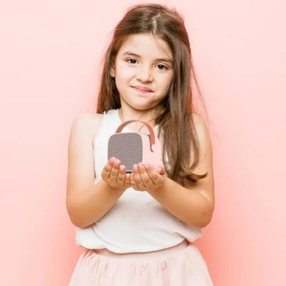 Compact Bluetooth karaoke device featuring TF card support, designed as a portable ABS music speaker for home entertainment, perfect for singing and enjoying music anywhere. 1