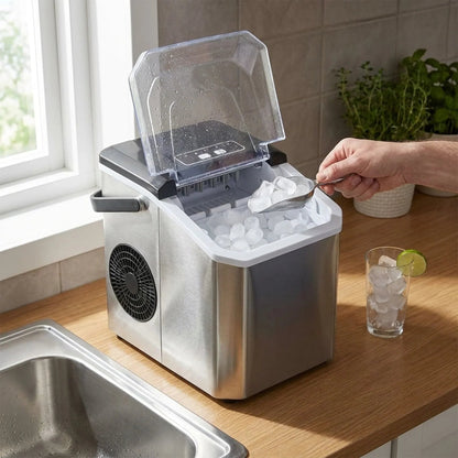 Compact Bullet Ice Maker with transparent lid, designed for home and office use, producing clear ice cubes efficiently on a sleek countertop. 1