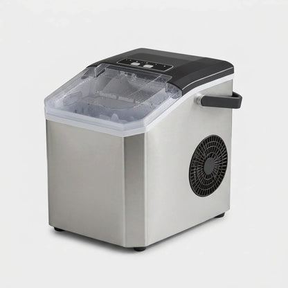 Compact Bullet Ice Maker with transparent lid, designed for home and office use, producing clear ice cubes efficiently on a sleek countertop. 2