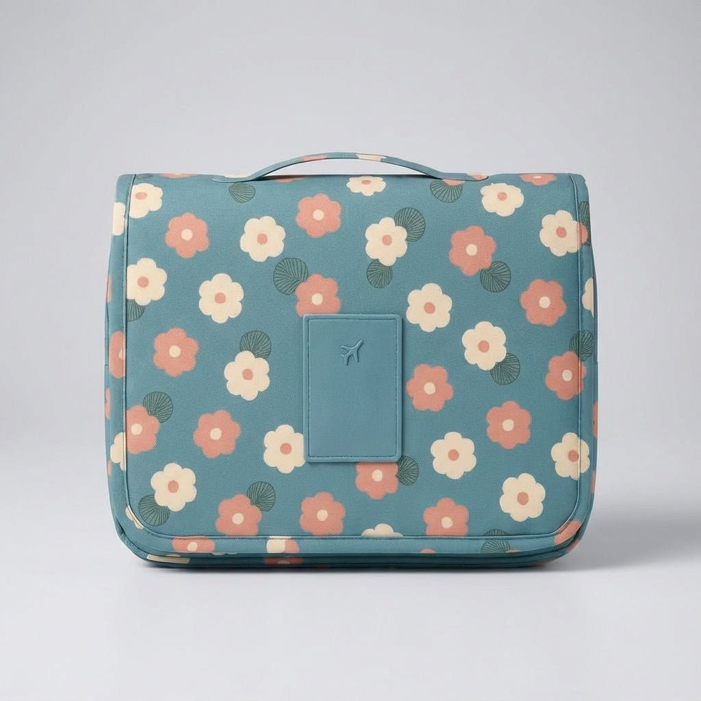 Compact hanging toiletry bag featuring a water-repellent surface and a vibrant floral print, designed as an organizer for women's travel essentials. 4