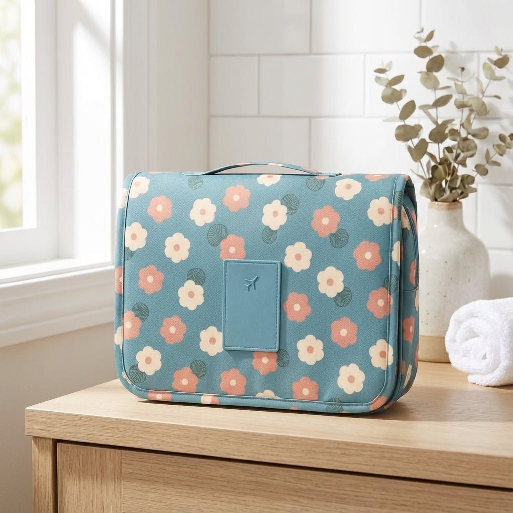 Compact hanging toiletry bag featuring a water-repellent surface and a vibrant floral print, designed as an organizer for women's travel essentials. 0