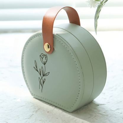 Compact jewelry box organizer made of travel-friendly PU leather, featuring a personalized name, perfect for keeping your accessories tidy and stylish on the go. 1